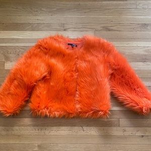 Beautiful, bright orange faux fur cropped jacket by Condigo